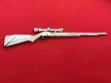 Marlin model 60 .22 semi auto rifle, with Simmons 3-9 scope, white camo ~ta