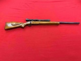 Mauser 243 bolt action rifle, heave barrel, with Weaver K10 60-8 scope ~tag
