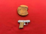 Raven Arms model P-25 .25 auto semi auto pistol, with leather purse ~tag#40