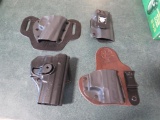 Holsters: 1 Sig Sauer, Locking OWB for Sig P228 2 CrossBreed OWB 1) 1911 1)