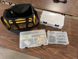 Cabela’s yellow soft sided fishing tackle box + 4 trays + lures + more cont