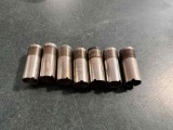 Remington 12ga chokes- (1) IC, (4) modified, (1) full, and (1) rifled~tag#4