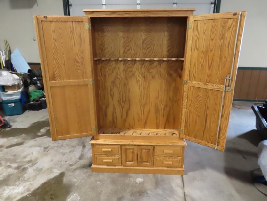 Oak gun cabinet, 46.5" wide x 75" high, 10 gun cabinet with 4 drawers and c