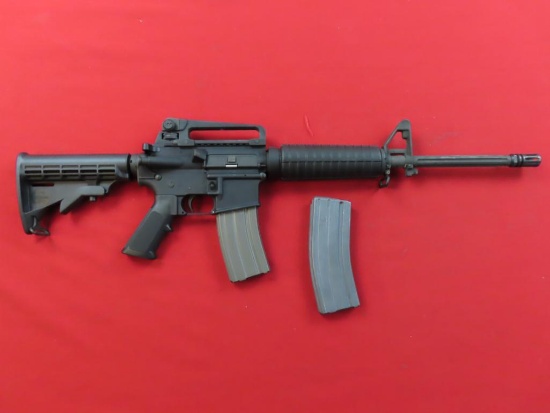 Bushmaster FM15-E2S AR-15 5.56mm semi auto rifle, Like New | BI1627684, tag