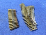 86 .308 Winchester blanks on links and 33rds 30-06 tracer rounds on links,