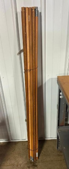 (15) wooden poles with threads, located in Mt. Pleasant, IA.