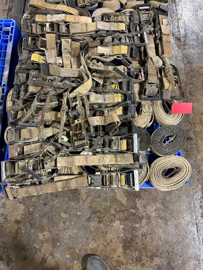(33) ratchet strap with binder, located in Mt. Pleasant, IA.