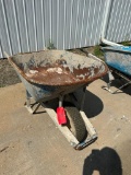 Jackson 6 cubic ft steel wheelbarrow with wood handle, located in Mt. Pleasant, IA.
