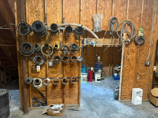 Contents on Wall: Pipe Gaskets, Brass Bearing and Housing, Hose, Misc.
