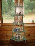 Assorted ceramic figurines and corner standing shelf