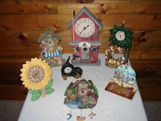 Six Assorted table top clocks and one Wall hanging Clock