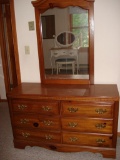 Dresser with attached mirror