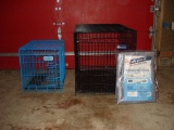 Two collapsible kennels