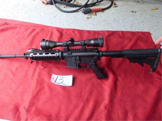 BUSHMASTER AR 15 RIFLE W/SCOPE AND LIGHT