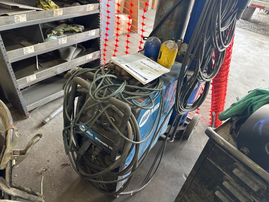 Miller Millermatic 252 MiG Welder has spool and book