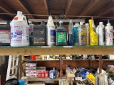 Top shelf of misc oils and work gloves