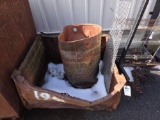 Metal skid and barrel