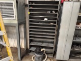 Shelving unit, vacuum and contents