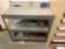 Metal shelved table