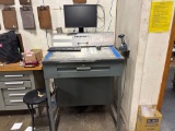 Standing desk with computer and contents