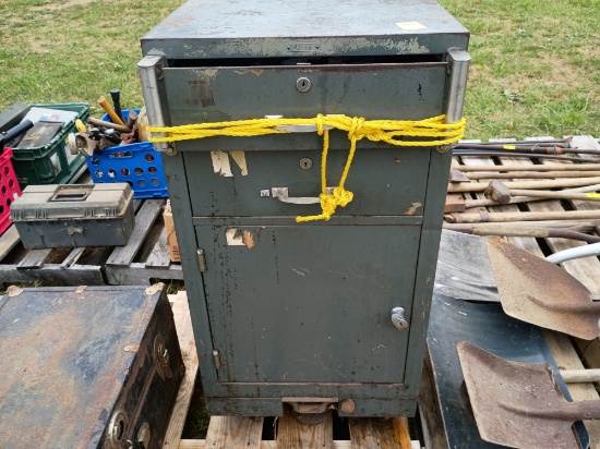 Metal cabinet on wheels and contents