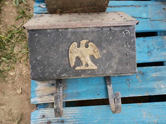 Vintage toolbox with plumbing fittings and mailbox