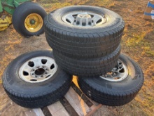 Lot of four 8 lug GMC rims and Mastercraft tires