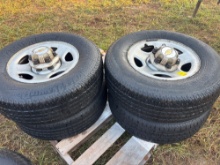 Lot of four 6 lug chevy rims and Uniroyal tires. Good tread.