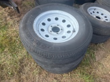 Set of three 5 lug trailer wheels and tires