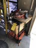 LOT CONSISTING OF: WIRE SHELVING UNIT WITH CONTENTS OF EXTENSION CORDS AND MISC.  ITEMS