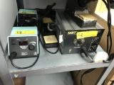 SOLDERING IRONS: (2) WELLER #WESD51, (1) PACE SENSATE MP (INCLUDING ROLLING CART)