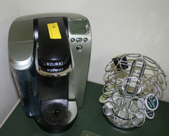 KEURIG COFFEE MAKER INCLUDES POD STAND