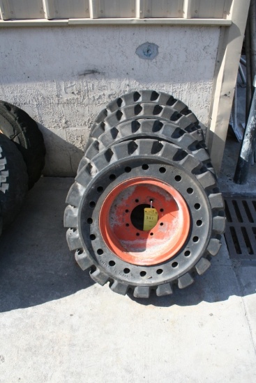 SET OF SOLID RUBBER TIRES AND RIMS