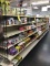 DOUBLE-SIDED GONDOLA SHELVING UNIT (ROW CONSIST OF (5) SECTIONS TOTALING 20' LONG X 5' HIGH)