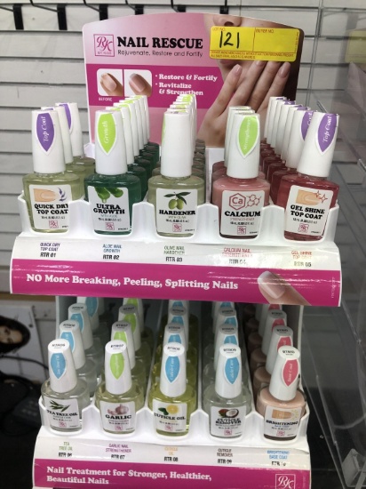 LOT CONSISTING OF COUNTER TOP DISPLAY UNIT WITH RK BY KISS NAIL RESCUE CUTICLE AND NAIL CARE PRODUCT