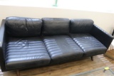 BLACK COUCH WITH GLASS TOP COFFEE TABLE