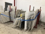 LOT CONSISTING OF (57) PARTIAL SLABS OF GRANITE,