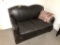 BROWN LEATHER LOVE SEAT WITH PILLOW