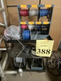 WIRE SPOOL RACK MOUNTED ON METAL CART