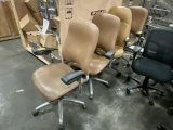 LIGHT BROWN VINYL ROLLING ARMCHAIRS