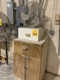 LOT CONSISTING OF WOOD CABINET AND FAN