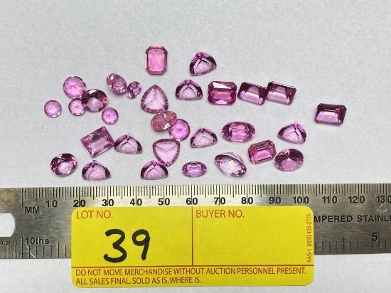 LOT CONSISTING OF TOPAZ PINK STONES