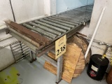 CURVED ADJUSTABLE HEIGHT MANUAL CONVEYOR