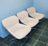 LOT CONSISTING OF (4) WHITE LEATHER SWIVEL CHAIRS
