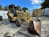 2005 KOMATSU WB 140 FRONT LOADER EXCAVATOR