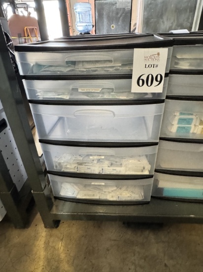 PLASTIC STORAGE CABINET WITH MEDICAL SUPPLIES