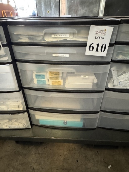 PLASTIC STORAGE CABINET WITH MEDICAL SUPPLIES