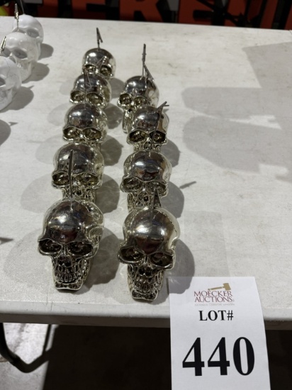 LOT CONSISTING OF SKULLS WITH CLIPS (CHROME) (9)