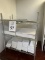 RACK WITH CONTENTS CONSISTING CANVAS FRAMES