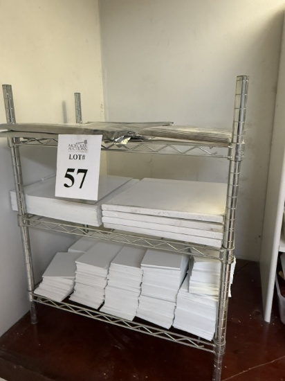 RACK WITH CONTENTS CONSISTING CANVAS FRAMES